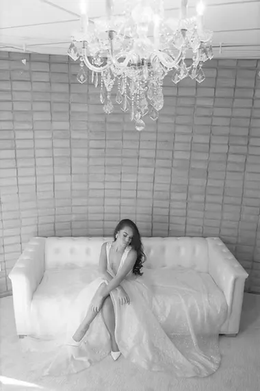 Bride sitting on a couch