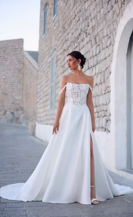 Fit-and-flare bridal gown with a front slit, reflecting true luxury beyond price.
